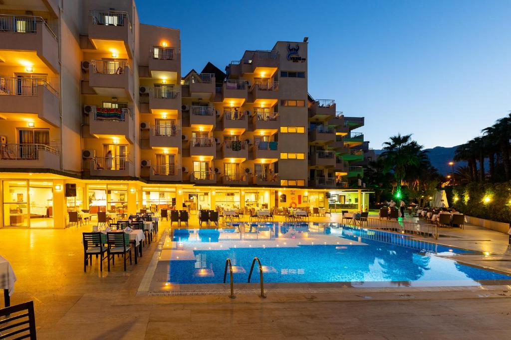 Viking nona beach hotel 4 турция кемер. Викинг Нона Бич. Viking Nona Beach 4*. Викинг Нона Бич отель в Кемере. Маджестик Кемер Бич.